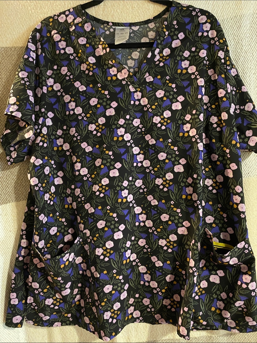 Wonder Wink Floral V-Neck Women’s scrub Top in Black and Lavender
